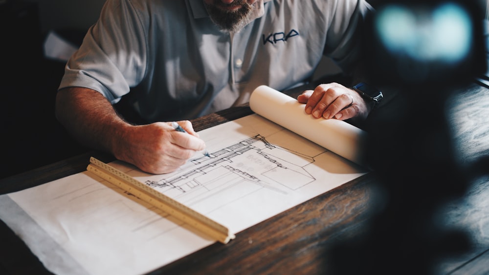 Detailed plans being drawn by hand at Exclusive Home Build